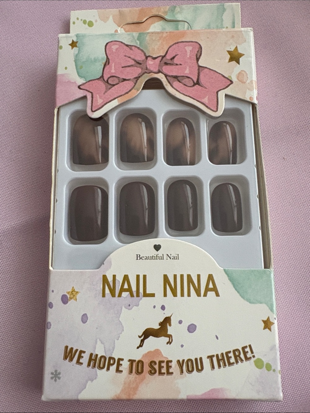 Two (2) Sets of Press on Nails Medium length